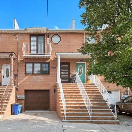 Buy this 6 bed townhouse on 59-14 74th Street in New York, NY 11378