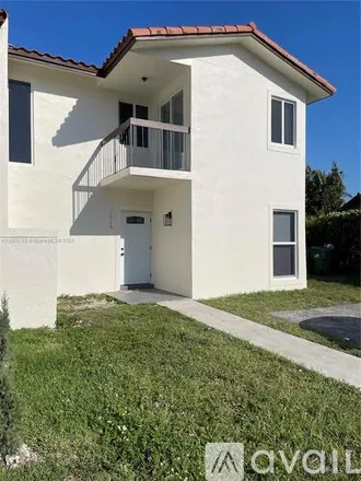 Rent this 4 bed house on 2513 SW 112 Th Ct