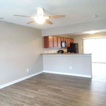 Rent this 2 bed townhouse on 4067 Grandeur Avenue in Lakewood, Jacksonville