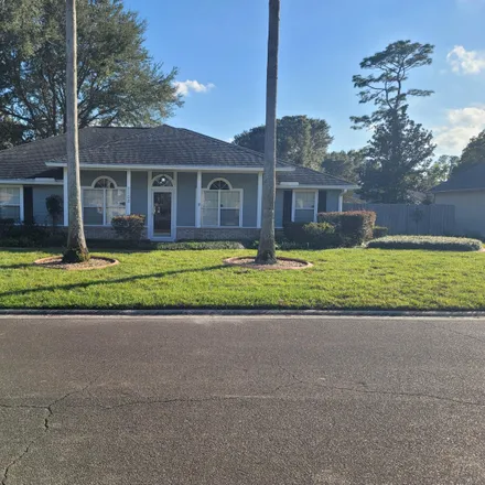 Rent this 4 bed house on 9108 Camshire Drive in Chimney Lakes, Jacksonville