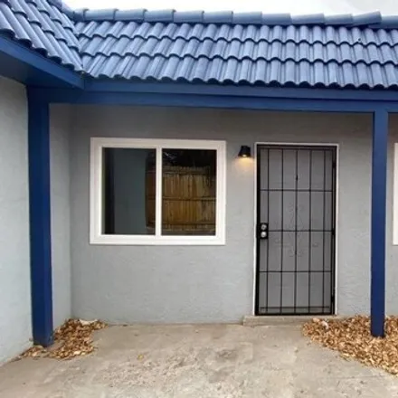 Rent this 2 bed house on 12172 Menaul Boulevard Northeast in Enchanted Park, Albuquerque