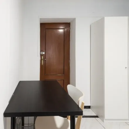 Rent this 11 bed room on Calle de la Colegiata in 7, 28012 Madrid