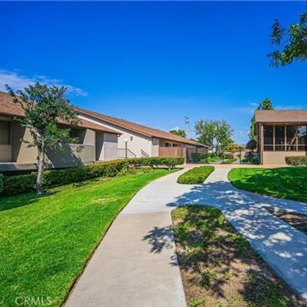 Buy this 2 bed condo on 1408 West Birchmont Drive in Anaheim, CA 92801
