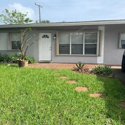 Rent this 3 bed house on 1648 Northeast 33rd Street in Cresthaven, Pompano Beach