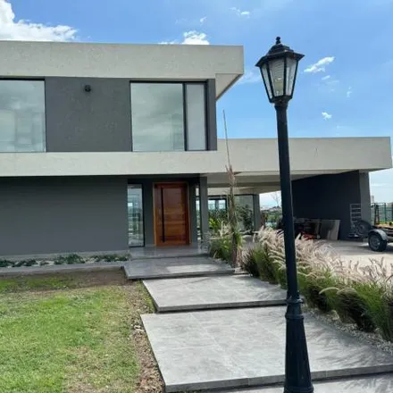 Buy this 4 bed house on Olegario Andrade in Villa Morra, B1629 CJU Pilar