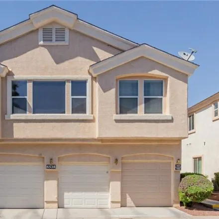 Buy this 3 bed townhouse on 6528 Ozzie Harriet Avenue in Clark County, NV 89122