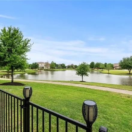 Buy this 5 bed house on 10433 Lavender Landing Lane in Towne Lake, TX 77433