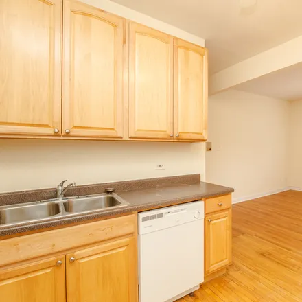 Rent this 2 bed apartment on 857 W Cornelia Ave