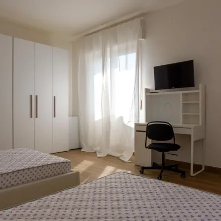 Rent this 4 bed room on Api in Via Francesco Primaticcio, 20147 Milan MI