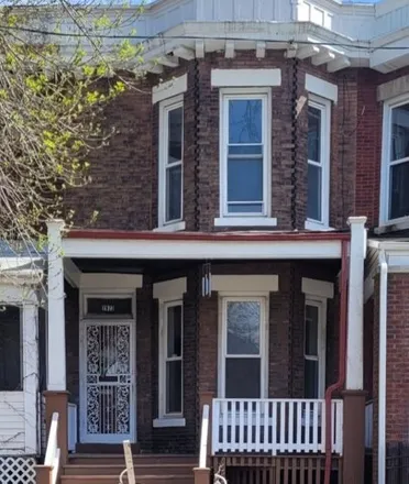 Buy this 4 bed townhouse on 2621 East 74th Street in Chicago, IL 60649