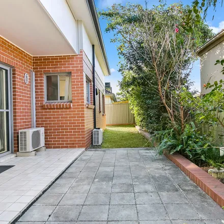 Rent this 3 bed townhouse on Hampden Road in Russell Lea NSW 2046, Australia