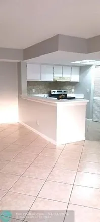 Rent this 2 bed condo on Riverside Drive in Coral Springs, FL 33065