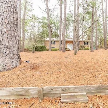 Buy this 3 bed house on 95 Pine Lake Drive in Whispering Pines, Moore County