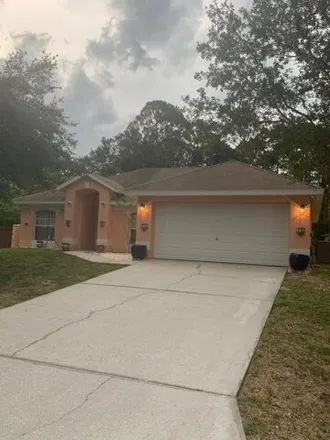 Rent this 3 bed house on 255 Gordon Rd NW in Palm Bay, Florida