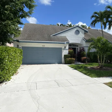 Buy this 3 bed house on 1148 Wild Cherry Lane in Wellington, Palm Beach County