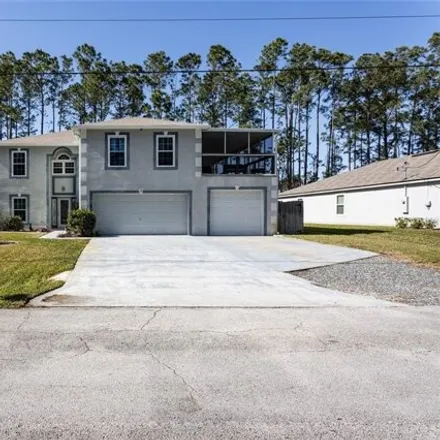 Buy this 4 bed house on 121 Ryberry Drive in Palm Coast, FL 32164