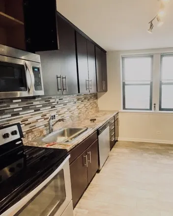 Rent this 3 bed apartment on 3933 North Clarendon Avenue