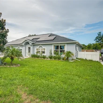 Buy this 4 bed house on 2728 Howland Boulevard in Deltona, FL 32725