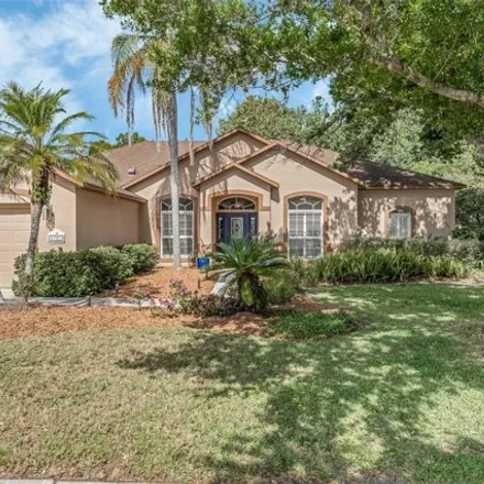 Buy this 4 bed house on 5721 Aloma Woods Boulevard in Jamestown, Seminole County