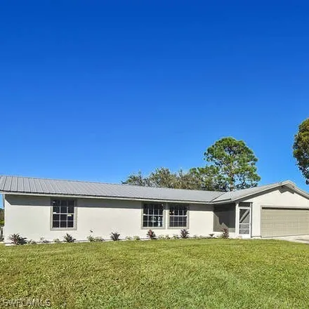 Buy this 3 bed house on 302 Floyd Avenue S in Lehigh Acres, FL 33976