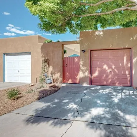 Buy this 2 bed house on 2628 Los Tomases Drive Northwest in Albuquerque, NM 87107