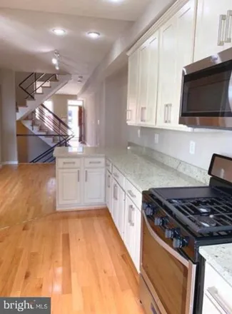 Rent this 4 bed house on 1628 South Charles Street in Baltimore, MD 21230