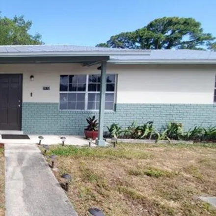 Rent this 2 bed house on 2566 Seneca Avenue in Paradise Park, Saint Lucie County
