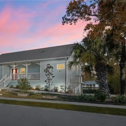 Buy this 4 bed house on Mockingbird Alley in New Port Richey, FL 34653