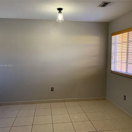 Rent this 3 bed apartment on 7481 Northwest 176th Terrace in Palm Springs North, Hialeah Gardens