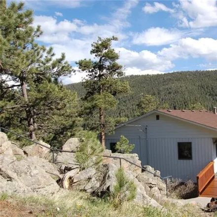 Buy this 4 bed house on 25368 Mosier Circle in Aspen Park, CO 80433