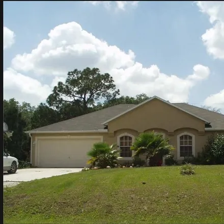 Buy this 3 bed house on 8933 102nd Court in Vero Lake Estates, Indian River County