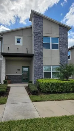 Buy this 5 bed townhouse on Ocean Course Avenue in Osceola County, FL 33897