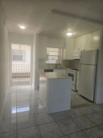 Rent this 2 bed condo on 121 Cleveland Street in Lake Worth Beach, FL 33461