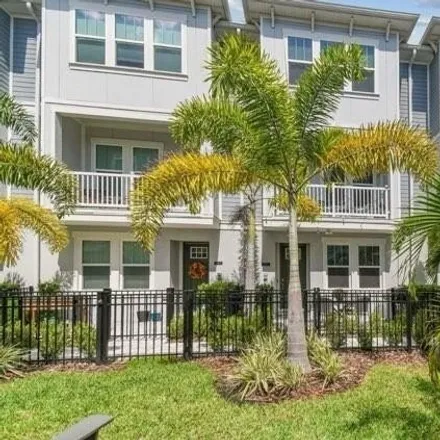 Rent this 3 bed townhouse on 258 South Tampania Avenue in Arrawana Park, Tampa
