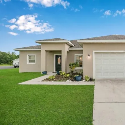 Buy this 4 bed house on 799 Palaiseau Court in Osceola County, FL 34759