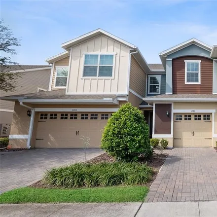 Buy this 3 bed townhouse on East Tenth Street in Orange County, FL 32703