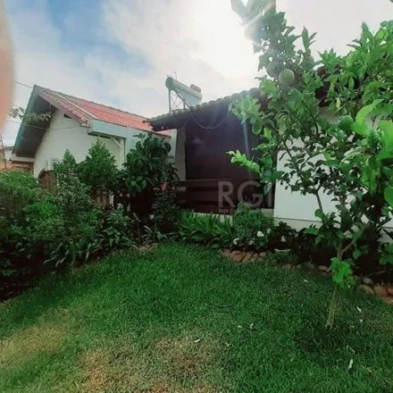 Buy this 4 bed house on Escola Machado de Assis in Rua Xavier da Cunha 680, Nonoai