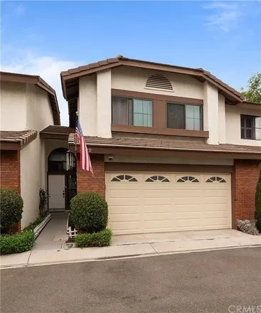 Buy this 3 bed townhouse on 8545 Courreges Court in Fountain Valley, CA 92708