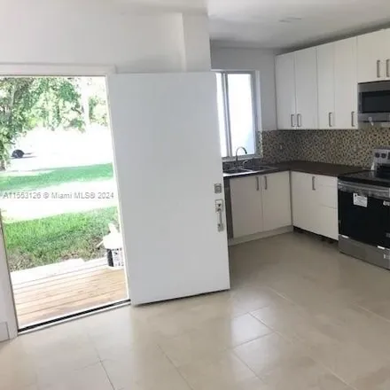 Rent this 3 bed house on 1460 Northeast 147th Street in Shady Oaks Trailer Park, North Miami