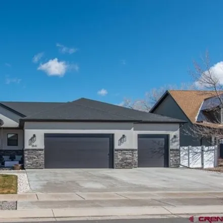 Buy this 3 bed house on 1587 Gold Creek Drive in Montrose, CO 81403