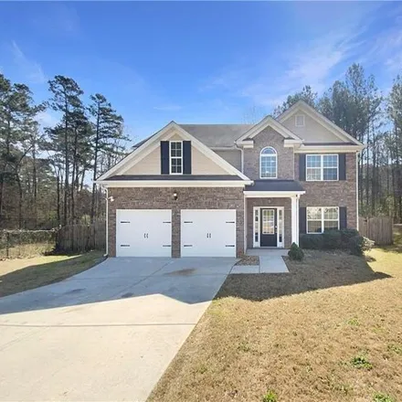 Buy this 4 bed house on 3948 Village Crossing Circle in Clayton County, GA 30294