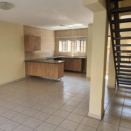 Rent this 2 bed townhouse on Marula Place in Winchester Hills, Johannesburg