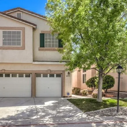 Buy this 5 bed house on 8915 Spinning Wheel Avenue in Las Vegas, NV 89143