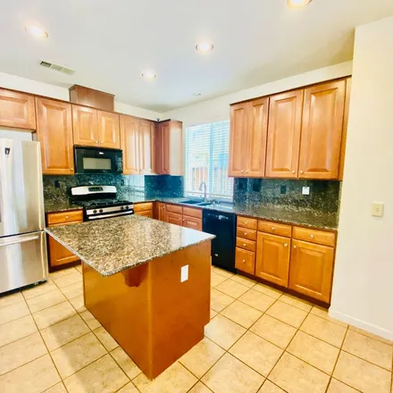 Rent this 5 bed apartment on 2386 North Rock Creek Drive in Los Banos, CA 93635
