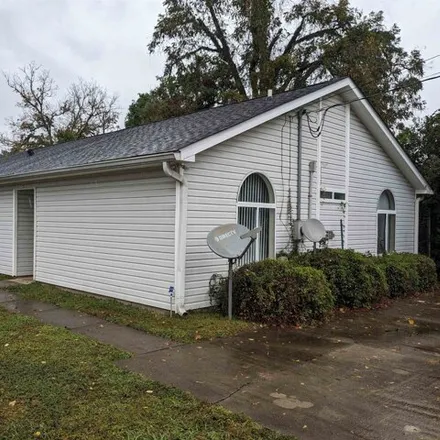 Rent this 4 bed house on 708 West Brevard Street in Tallahassee, FL 32304