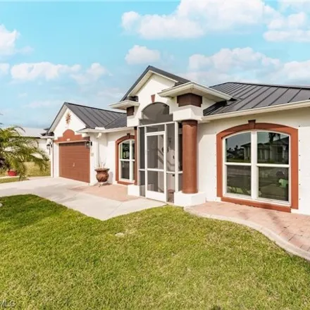 Buy this 3 bed house on 1295 Northwest 40th Place in Cape Coral, FL 33993
