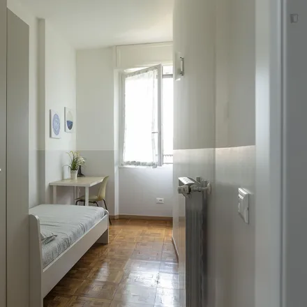 Rent this 8 bed room on K2 in Via Antonio Stoppani, 20129 Milan MI