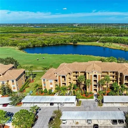Buy this 2 bed condo on River Strand Golf & Country Club in 7155 Grand Estuary Trail, Bradenton