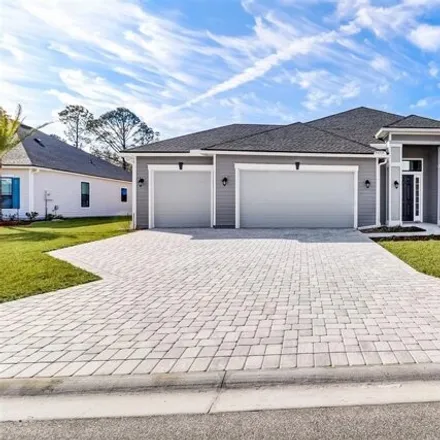 Rent this 3 bed house on Palm Pointe Drive North in Nassau County, FL