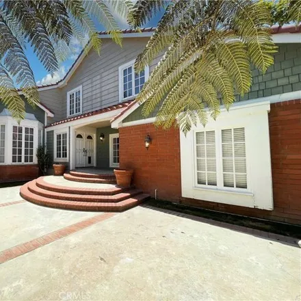 Buy this 5 bed house on 19375 Woodlands Lane in Huntington Beach, CA 92648